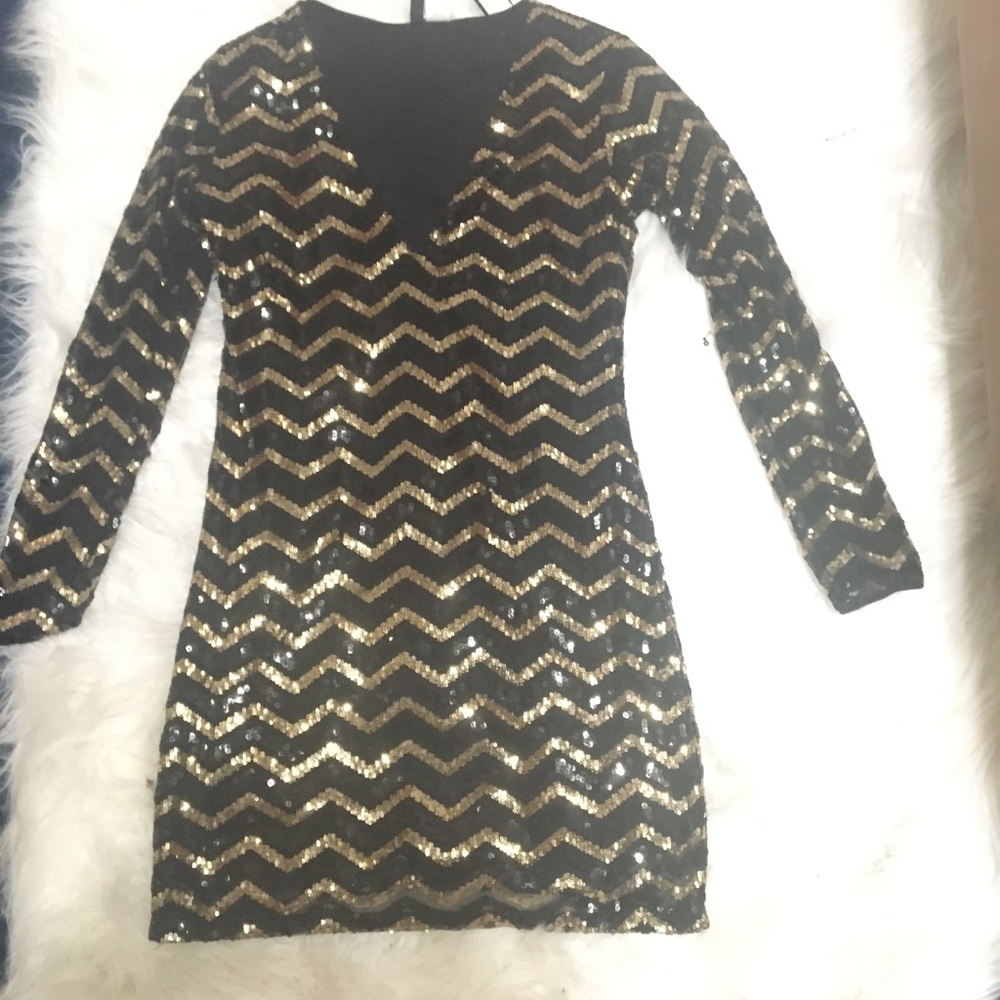 Gold and black sequin dress